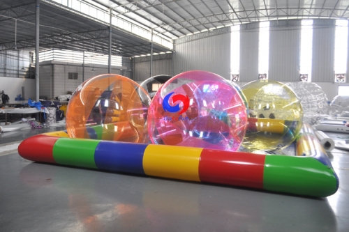 mixed color floating inflatable water rolling walking ball with colorful inflatable swimming pool for sale