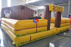 customized large Western inflatable crash mattress kids adult mechanical rodeo bull riding toys for sale