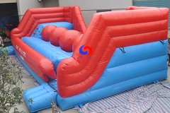 interactive games inflatable obstacle course 4 huge red balls Leaps N Bounds Big Baller wipeout for kids adults