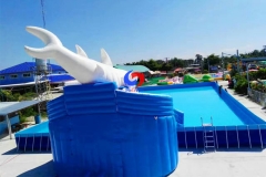commercial movable large above ground metal frame swimming pools with big shark inflatable water slides for sale