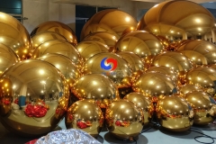 Lighting, Weddings, Corporate, Live Events beautiful decor giant mirror spheres chrome balloons adorning ceiling & architecture