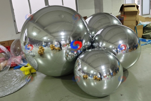 Bespoke balloon backdrop custom big shiny silver golden inflatable mirror balls for themed parties event decor planning