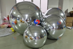 Bespoke balloon backdrop custom big shiny silver golden inflatable mirror balls for themed parties event decor planning